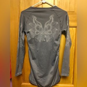 Athletic fitted top. Perfect for running or working out. In very good condition.